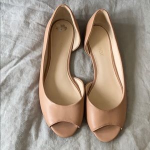 Nude peep toe flats
